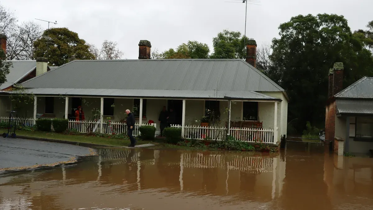 What are climate refugees and why does the term spark debate?